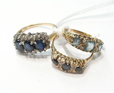 Lot 109 - A diamond and sapphire cluster ring and two dress rings