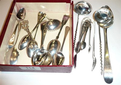 Lot 114 - A pair of Georgian silver sauce ladles, eleven spoons and three pairs of tongs, 12oz