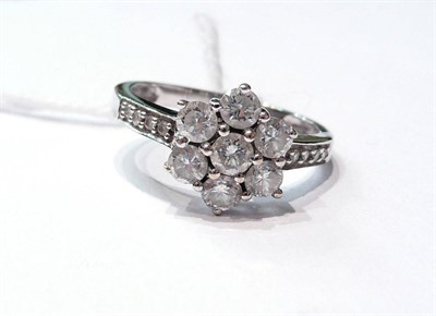 Lot 115 - An 18ct white gold and diamond cluster ring