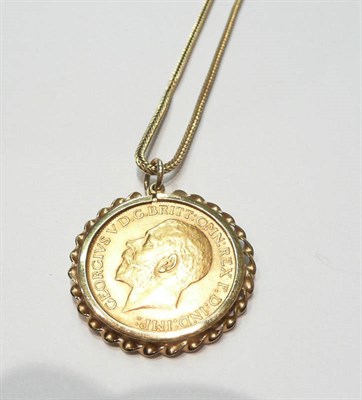 Lot 122 - A 1912 gold sovereign loose mounted on a chain