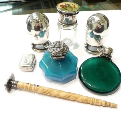 Lot 128 - A small silver vinaigrette, a scent bottle, another, a salt and pepper, a seal and a bottle