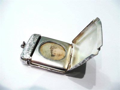 Lot 133 - A silver vesta case set with a miniature portrait