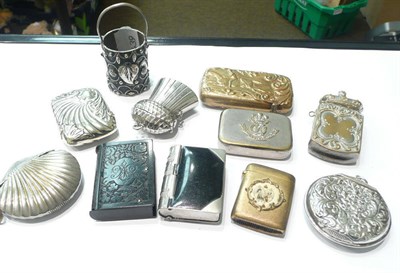 Lot 146 - Ten plated and other fancy vesta cases and a bucket-shaped match holder