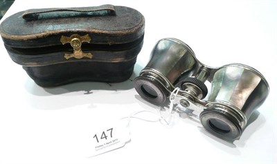 Lot 147 - A pair of 19th century nickel silver and mother-of-pearl opera glasses, retailed by Z...