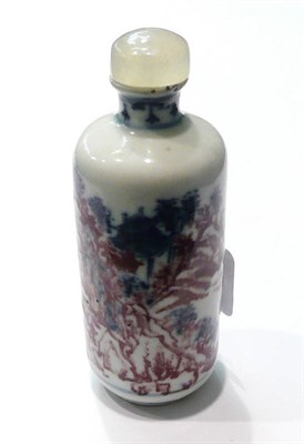 Lot 150 - A Chinese red and blue porcelain snuff bottle and stopper with scoop