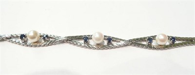 Lot 151 - A 14ct gold bracelet set with cultured pearls and sapphires