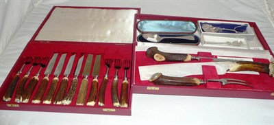 Lot 158 - A cased carving set, a cased cutlery set, a Christening spoon, a commemorative spoon and...