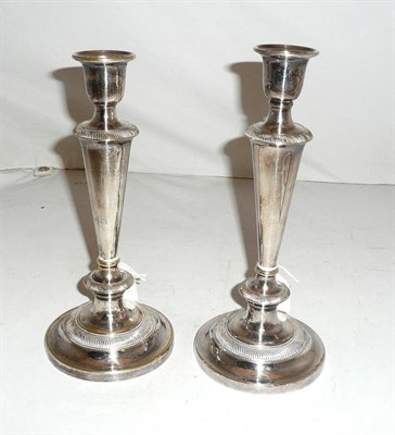 Lot 163 - A pair of electroplate candlesticks