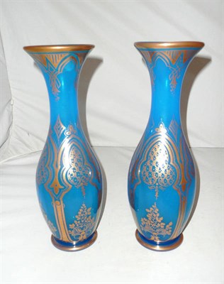 Lot 168 - A pair of Victorian blue and gilt glass vases