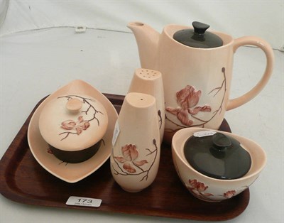 Lot 173 - A Carlton Ware Magnolia teapot, a sucrier, a salt and pepper, a trinket box and a plate