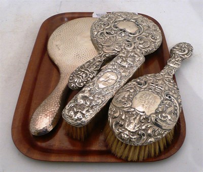 Lot 189 - Two silver backed mirrors and two brushes