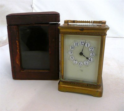 Lot 225 - A carriage timepiece in a leather case