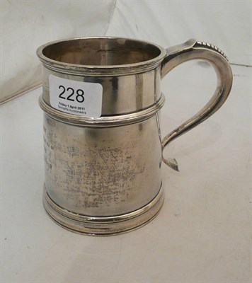 Lot 228 - An engraved silver mug