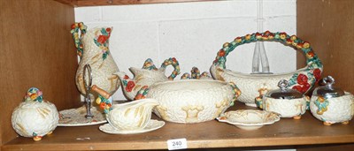 Lot 240 - Eleven pieces of 'Celtic Harvest' Clarice Cliff pottery, comprising; a basket, a teapot and...