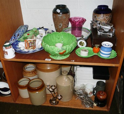 Lot 245 - Two shelves of decorative ceramics, glass and ornamental items including a Charlotte Rhead...