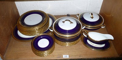 Lot 246 - An Aynsley blue and gold dinner service