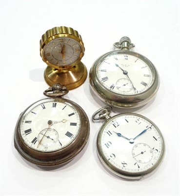 Lot 259 - A silver pair cased pocket watch, two top-wind pocket watches and a Garrard alarm timepiece