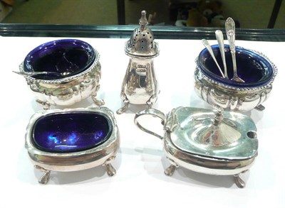 Lot 264 - A silver three piece condiment set and a pair of silver salts (5)