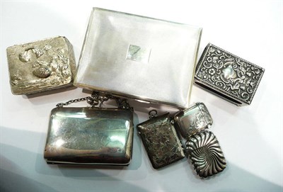 Lot 265 - A cigarette box, three vestas, a purse, a match box holder and a box