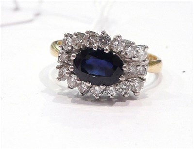 Lot 273 - An 18ct gold sapphire and diamond ring