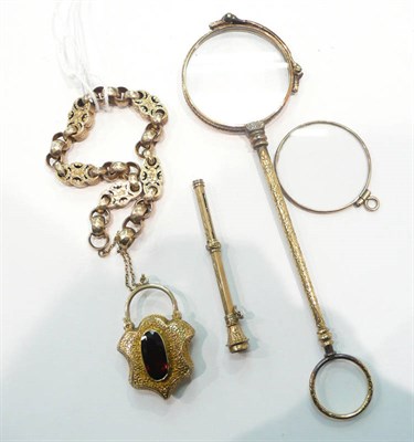 Lot 288 - A fancy link bracelet with a garnet set padlock clasp. a Victorian pencil and a lorgnette