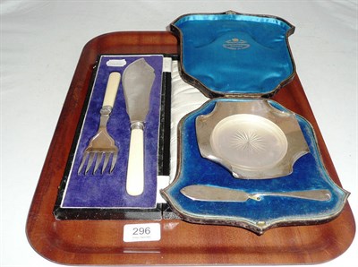 Lot 296 - A cased silver butter dish and knife and a plated fish slice and fork