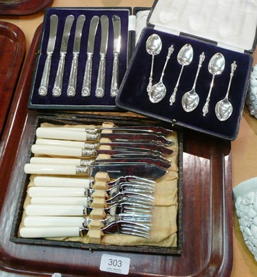 Lot 303 - Six silver apostle teaspoons, six tea knives and a set of fish knives and forks cased