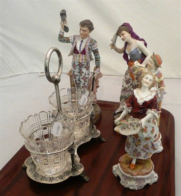 Lot 305 - Two pairs of German figures (a.f.), a plated stand with two glass liners