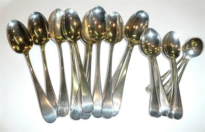 Lot 358 - Eleven Old English pattern silver dessert spoons inscribed 'WW' and eight silver teaspoons,...