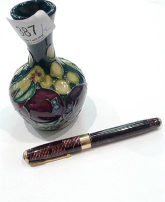 Lot 387 - A Moorcroft pottery vase and a Parker fountain pen