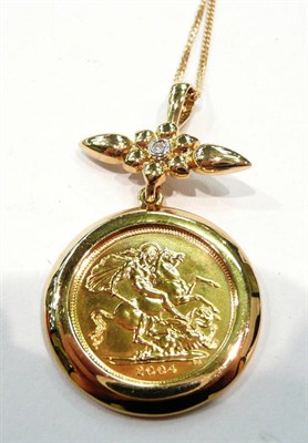 Lot 391 - A 2004 half sovereign set as a pendant with chain