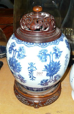 Lot 397 - Large blue and white ginger jar with cover and stand