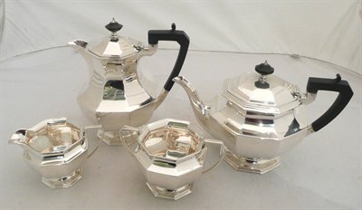 Lot 401 - A silver four piece tea service, 57oz