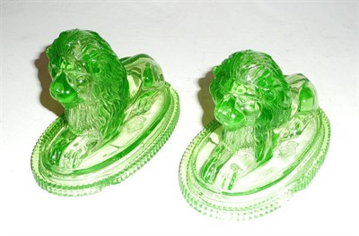 Lot 406 - A pair of John Derbyshire green glass lions