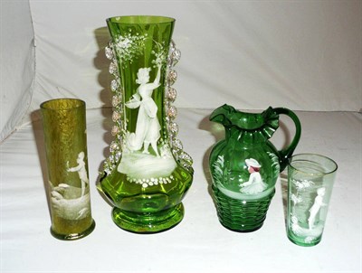 Lot 409 - A Mary Gregory green glass jug, two vases and a beaker