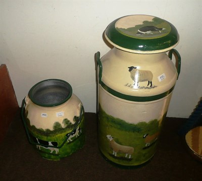 Lot 430 - An aluminium milk churn painted with sheep and a similarly-decorated bucket