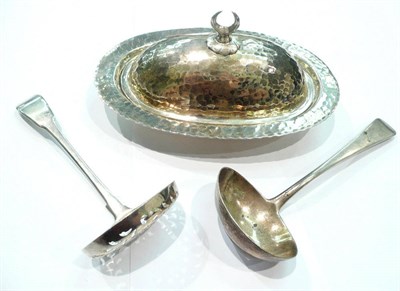 Lot 447 - A silver sifter spoon, a sauce ladle, a silver 925 dish and cover and a patch box