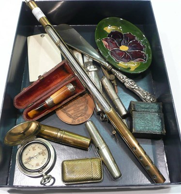 Lot 461 - A small Moorcroft pottery dish, a gold mounted amber cigar holder in a silver case etc