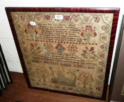 Lot 511 - A 19th century needlework sampler by Mary Booth, 1821 (a.f.)