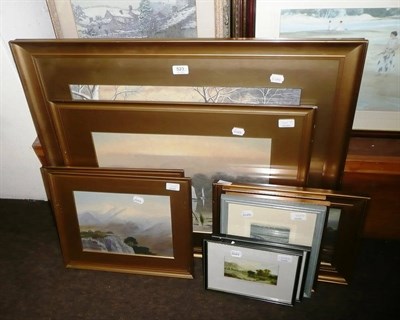 Lot 523 - Four watercolour landscapes signed by Edward Thompson, a similar watercolour and five other...