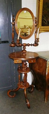 Lot 544 - A Victorian walnut shaving stand with candle branches