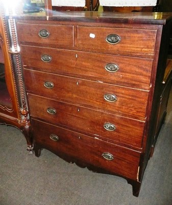 Lot 580 - A late Georgian mahogany five height chest