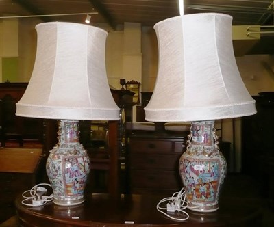 Lot 593 - A pair of Cantonese porcelain vase table lamps