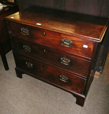 Lot 603 - A George lll mahogany three height chest