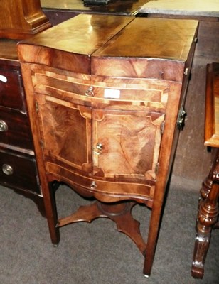 Lot 607 - A George III mahogany Serpentine front enclosed washstand