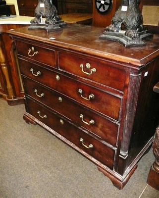 Lot 612 - Georgian mahogany chest of drawers with fluted pilasters