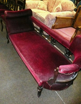 Lot 628 - A Victorian carved walnut five piece salon suite of four chairs and a chaise