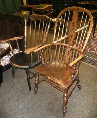 Lot 642 - An elm high back Windsor chair with saddle seat and a beech stick back elbow chair