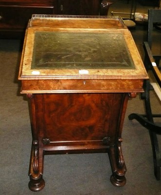 Lot 647 - A Victorian walnut davenport