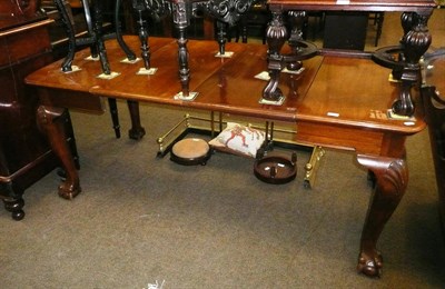 Lot 654 - Mahogany windout dining table (with two leaves and winder)